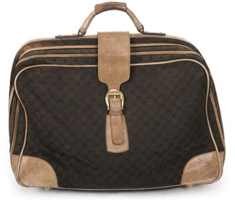 bond the man with the golden gun gucci bag|Gucci suitcase .